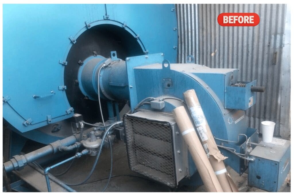 Industrial machinery setup with a large blue pipe and attached equipment.